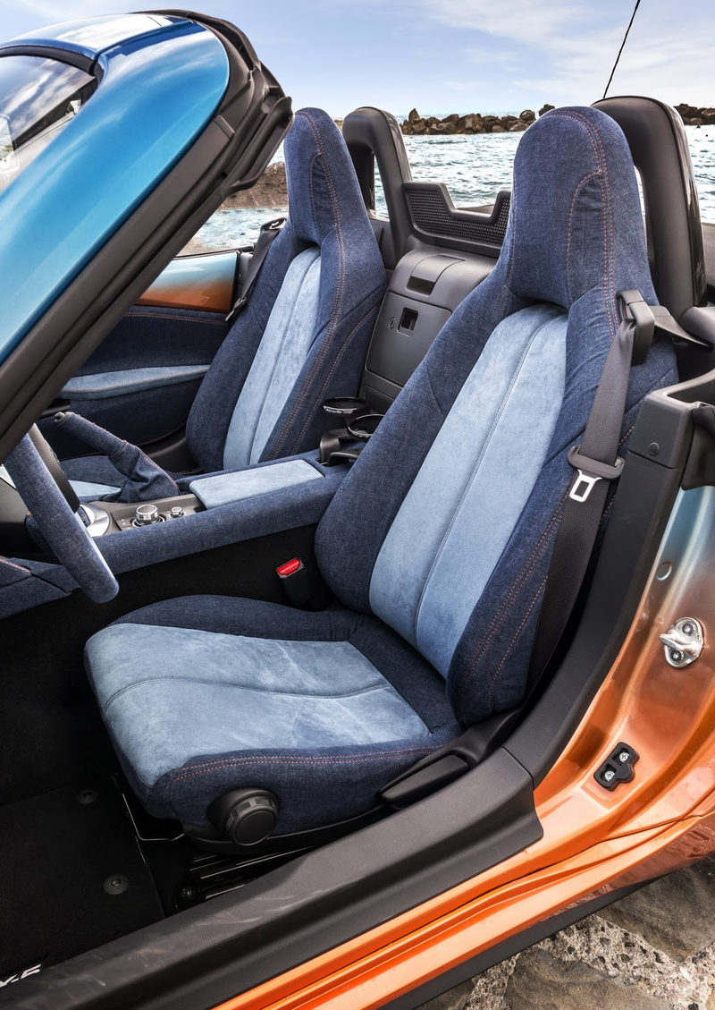 Illustration for article titled Placate Your Fears Of Global Economic Collapse With This Two-Tone Miata With A Denim Interior